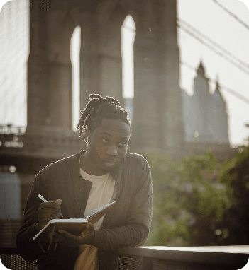 Person writing in sunlight